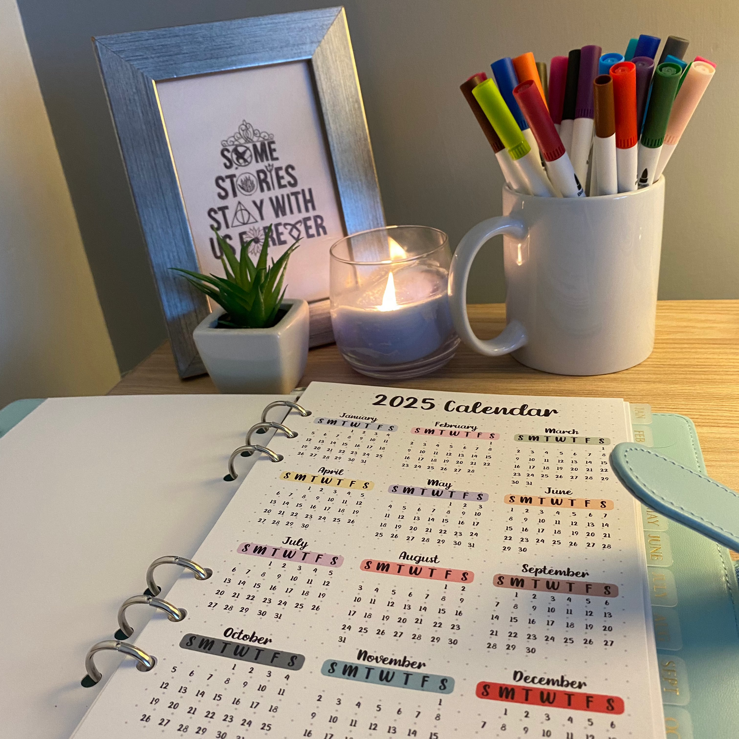 Binder with a 2025 calendar bullet journal page